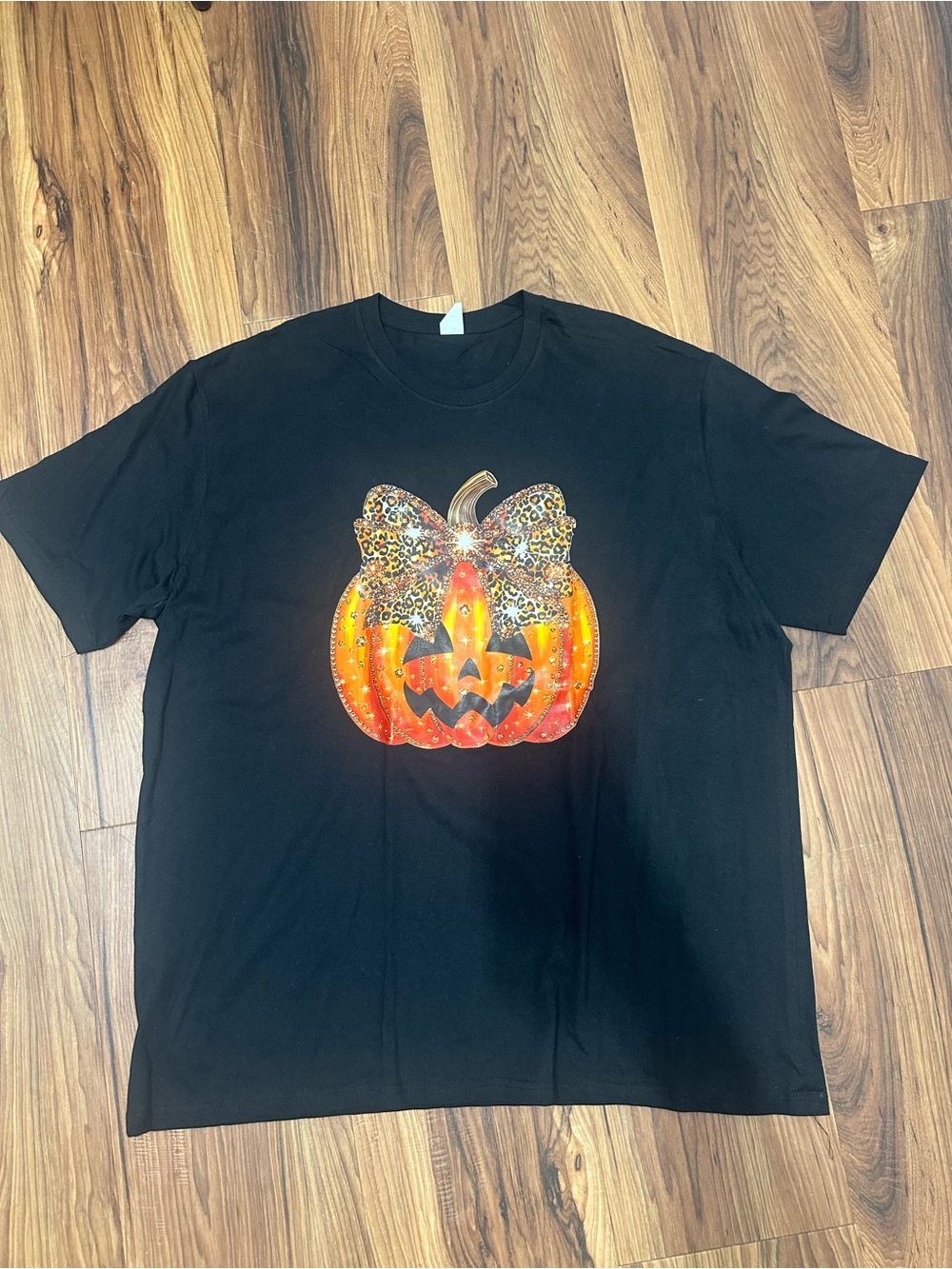 Black Short-Sleeve Tee with Sparkling Pumpkin and Leopard Bow